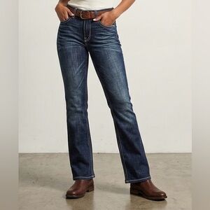 Joe’s blue jeans, fashionably ripped in the back, good condition, size 24